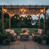 Outdoor patio with wooden pergola, seating area, and string lights.